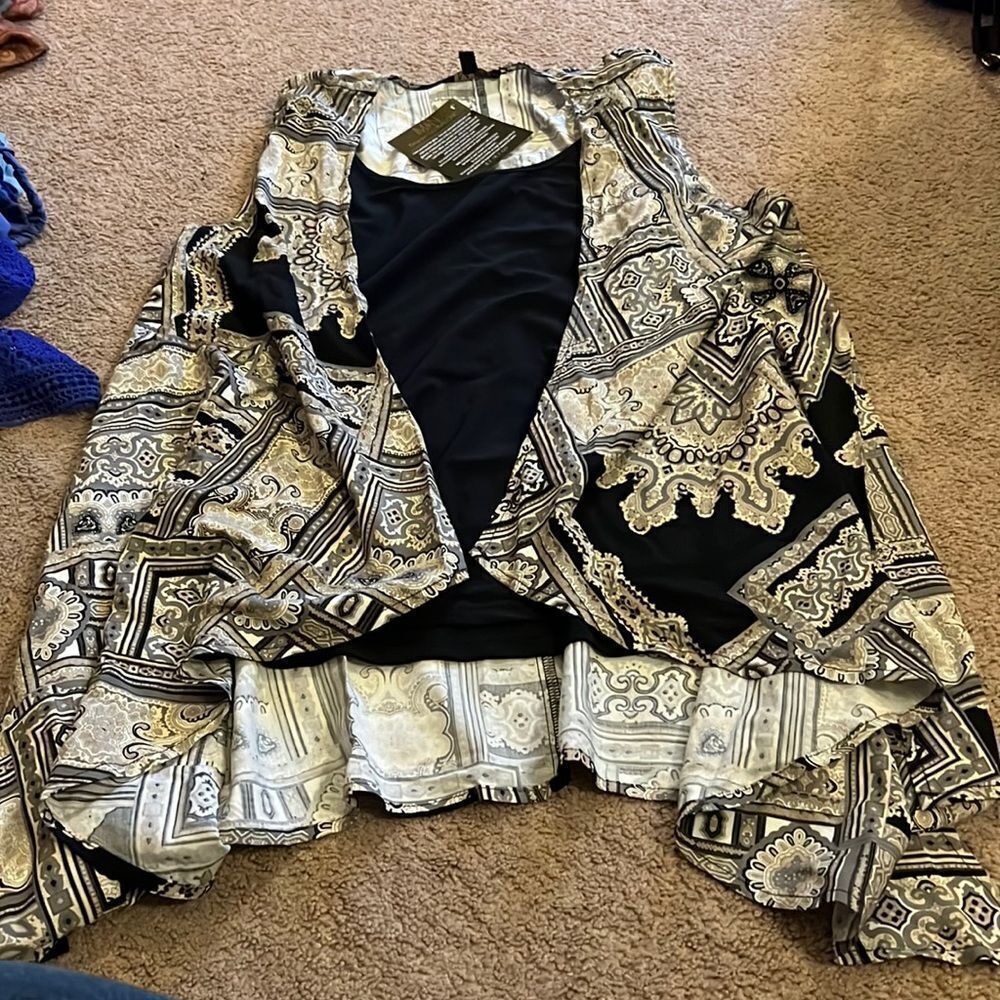 NWT iman medium blouse‎